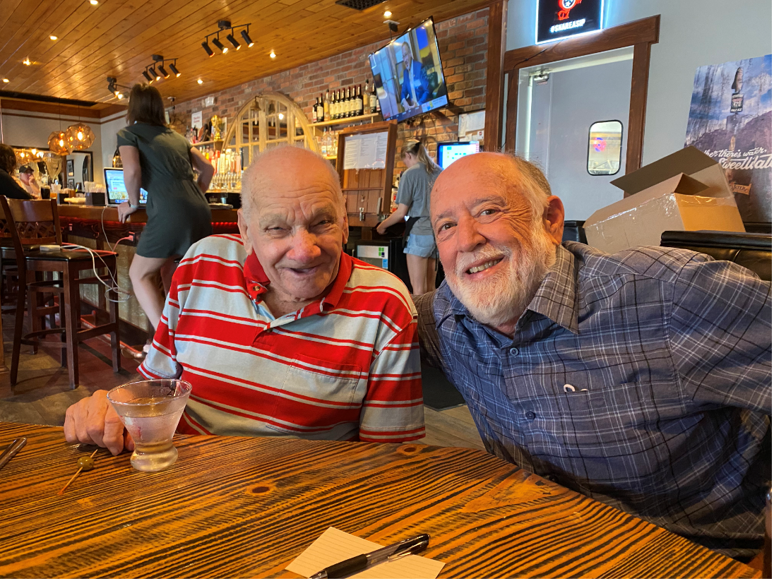 John D’Antonio (left) and Bob Anderson share a beer at a restaurant in Decatur.
